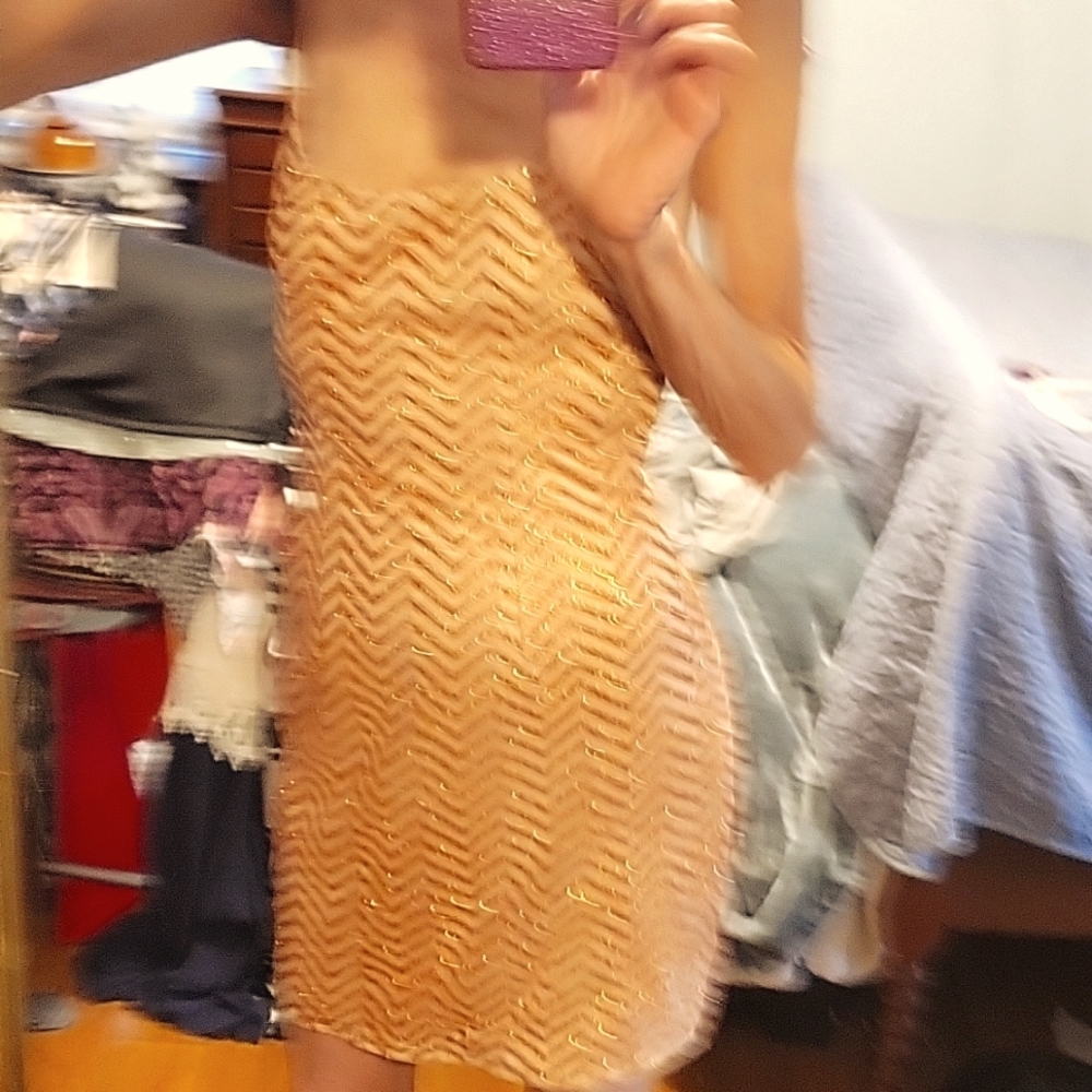 Orange glitter body con dress with gold straps and gold tie up back straps